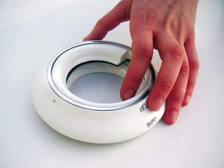 Illustration for article titled Sens Time By Touch Clock For The Blind Is Sexy And Round